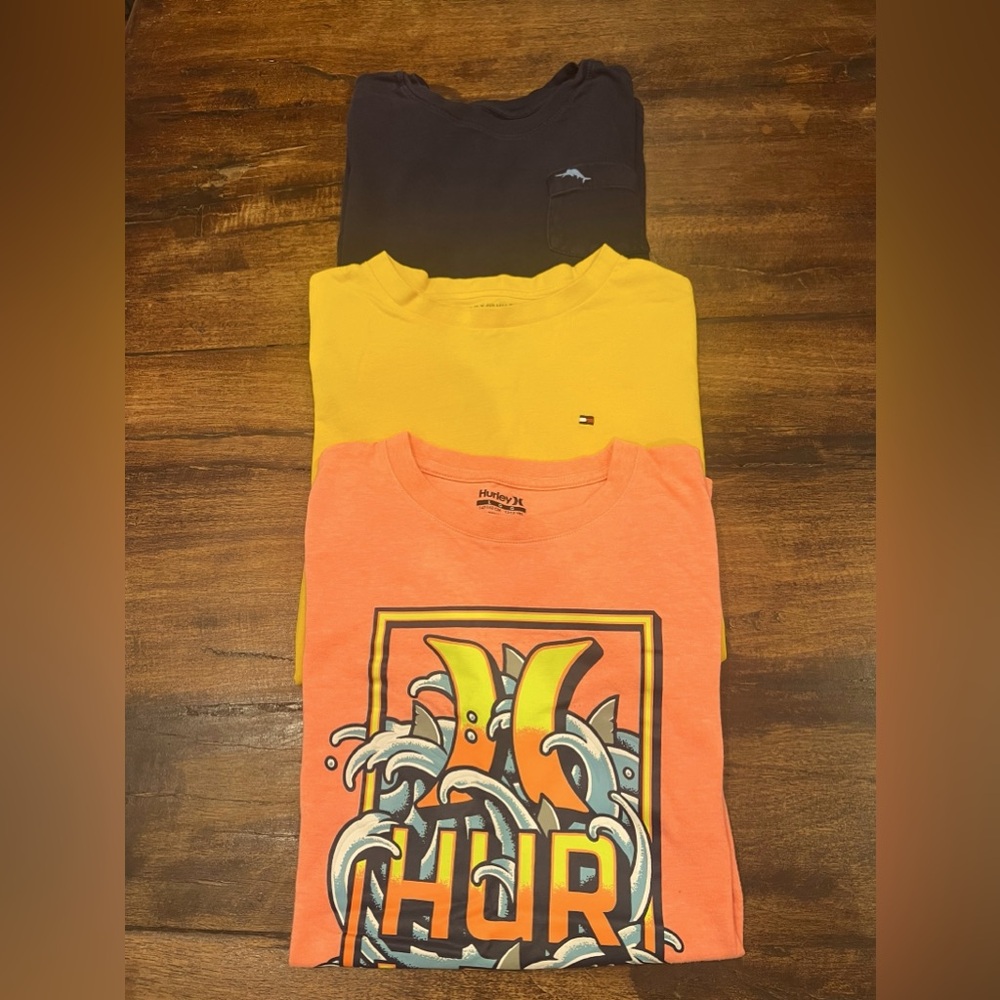 Lot of three boys name brand, short sleeve tshirts, size large.